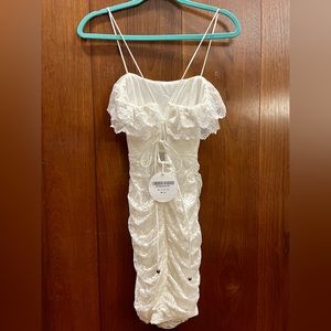 White lace ruffle mini dress with tie-up back